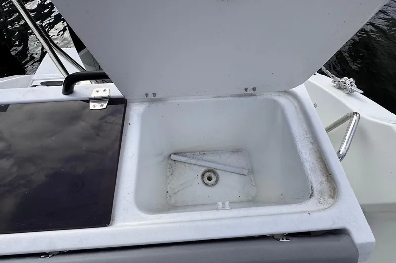 Slide: The Image of Open storage compartment on 2024 Beneteau Flyer 7 SPACEdeck boat. - 30