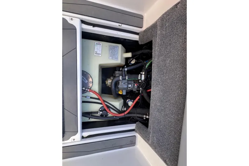 Slide: The Image of 2023 Axis T220 boat propeller and rudder on trailer, close-up view. - 30