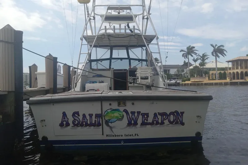 Slide: The Image of 1987 Rampage 28 Sportsman docked. - 0