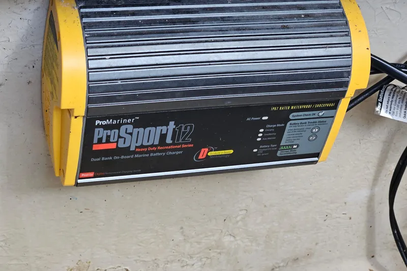 Slide: The Image of 1987 Rampage 28 Sportsman engine compartment with visible components and wiring. - 41