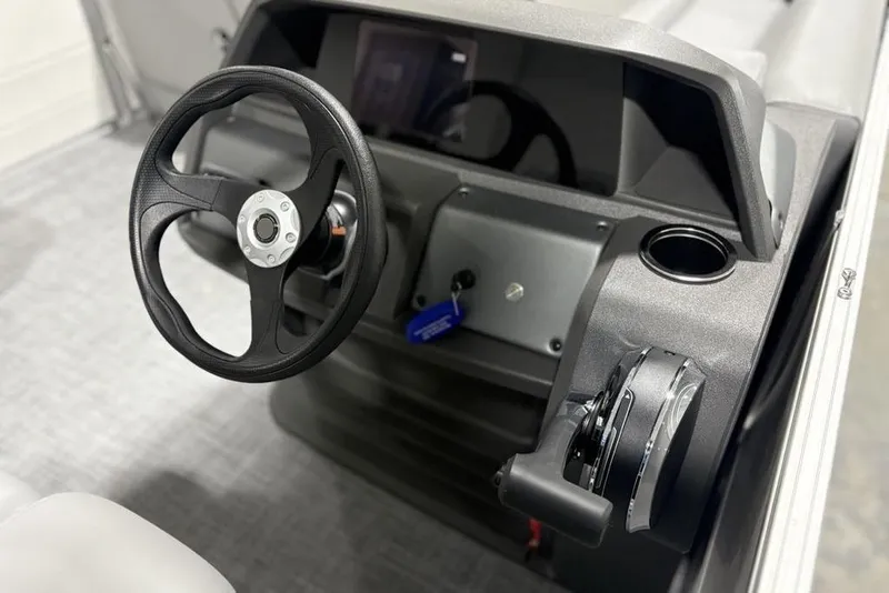 Slide: The Image of Steering console of 2026 Sun Tracker Party Barge 18 DLX pontoon boat. - 18