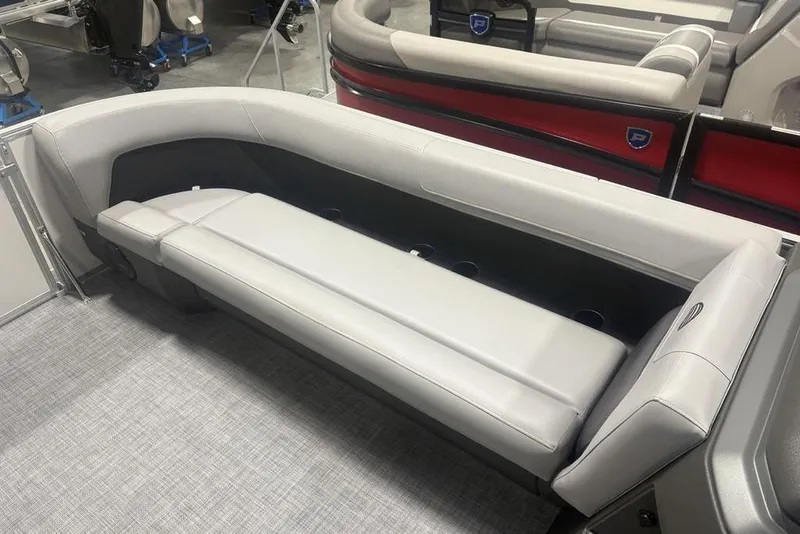 Slide: The Image of 2026 Sun Tracker Party Barge 18 DLX interior seating with gray upholstery. - 3