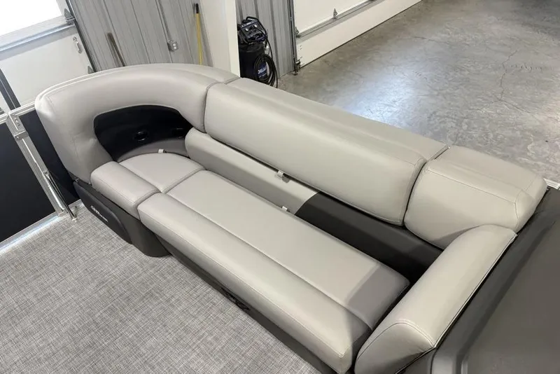 Slide: The Image of 2026 Sun Tracker PARTY BARGE® 20 DLX interior with luxurious gray seating. - 4
