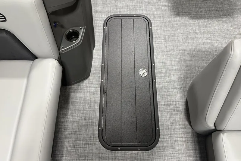 Slide: The Image of Interior of 2026 Sun Tracker Party Barge 22 XP3 with seating and storage compartment. - 14