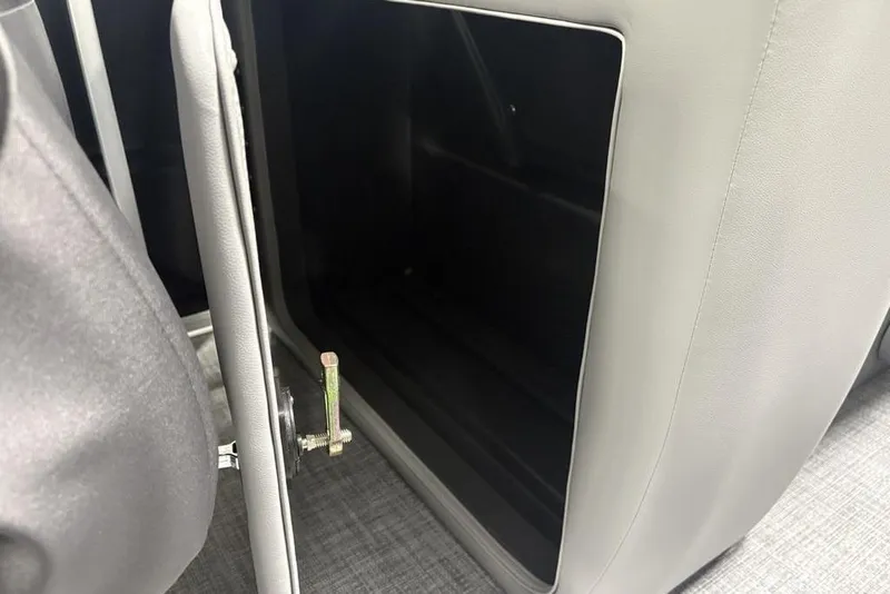 Slide: The Image of Open storage compartment in 2026 Sun Tracker Party Barge 22 XP3 pontoon boat. - 23