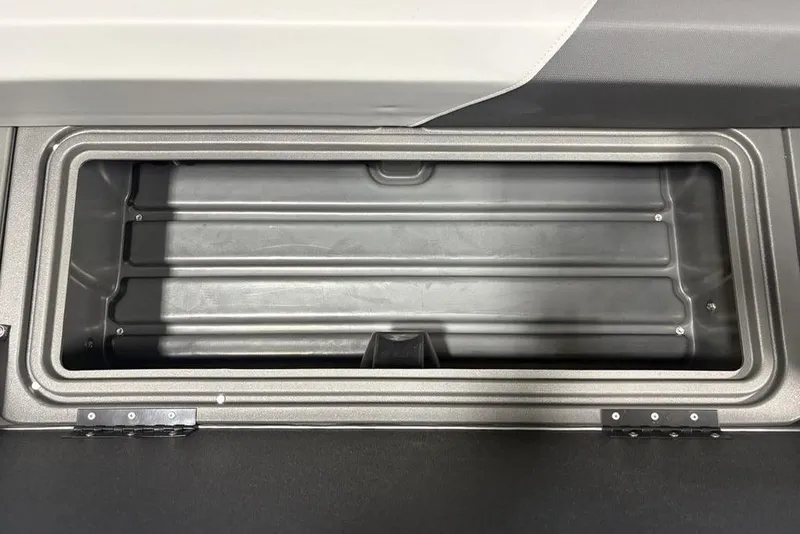 Slide: The Image of Storage compartment of 2026 Sun Tracker Party Barge 22 XP3 pontoon boat. - 6