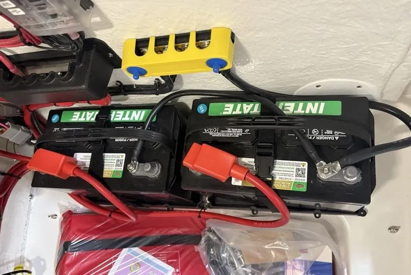 Slide: The Image of Four Interstate batteries installed in a 2026 Tidewater 2210 Carolina Bay boat. - 18