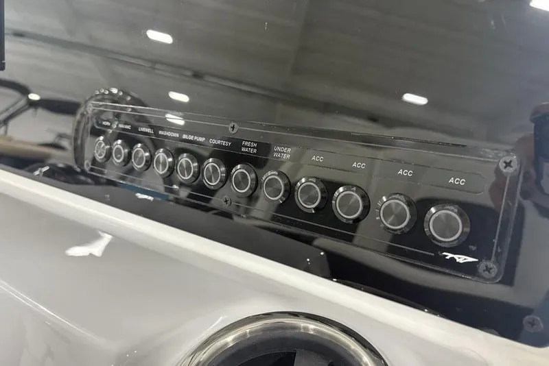 Slide: The Image of Fusion audio system on 2026 Tidewater 2210 Carolina Bay boat dashboard. - 25