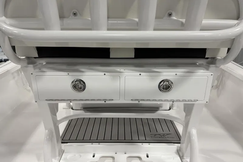 Slide: The Image of 2026 Tidewater 2210 Carolina Bay boat interior with seating and storage compartments. - 30