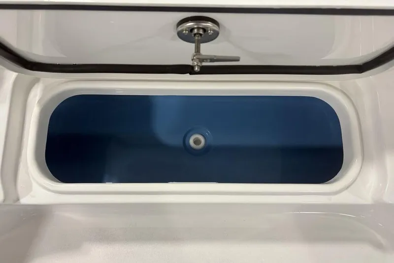 Slide: The Image of Livewell compartment of 2026 Tidewater 2300 Carolina Bay boat. - 10