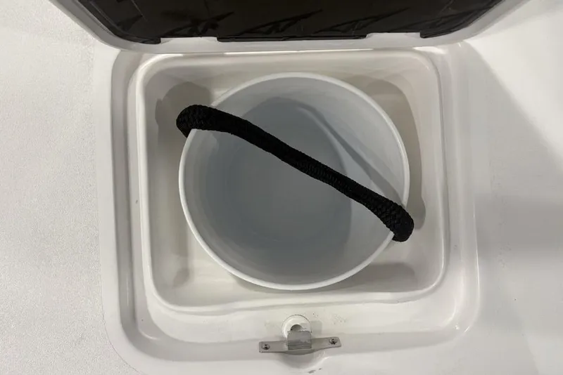 Slide: The Image of Storage compartment with bucket in 2026 Tidewater 2300 Carolina Bay boat. - 15