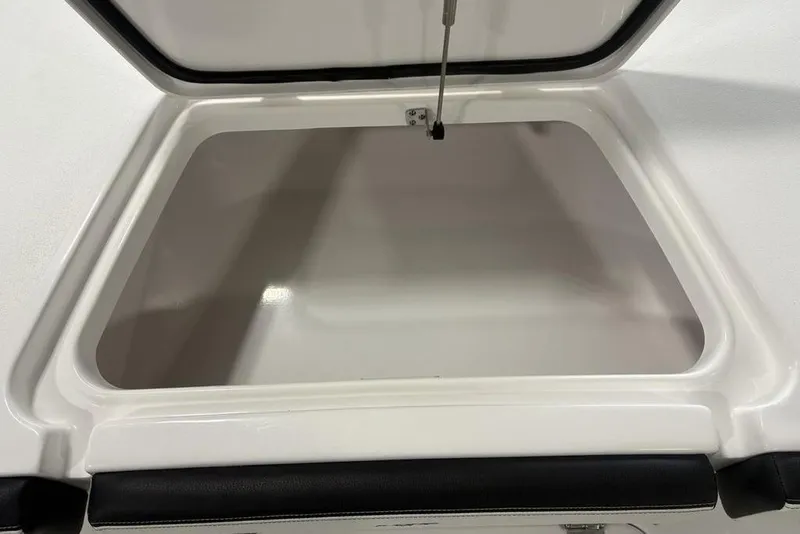 Slide: The Image of Open storage compartment in 2026 Tidewater 2300 Carolina Bay boat. - 9