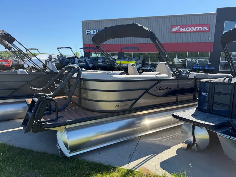 Slide: The Image of 2026 Bentley Pontoons Legacy 240 Navigator at a Honda dealership. - 3