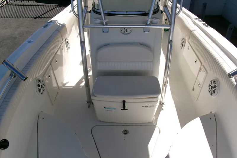 Slide: The Image of 2009 Hydra-Sports 2500 CC boat interior with seating and storage compartments. - 10