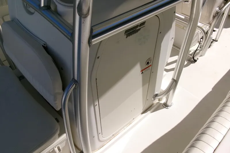 Slide: The Image of 2009 Hydra-Sports 2500 CC boat interior with seating and storage compartment. - 11