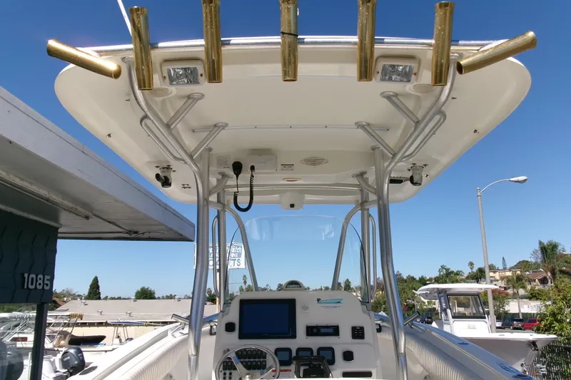 Slide: The Image of 2009 Hydra-Sports 2500 CC boat console with T-top and fishing rod holders. - 15