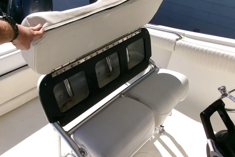 Slide: The Image of 2009 Hydra-Sports 2500 CC boat seat with storage compartment open. - 18
