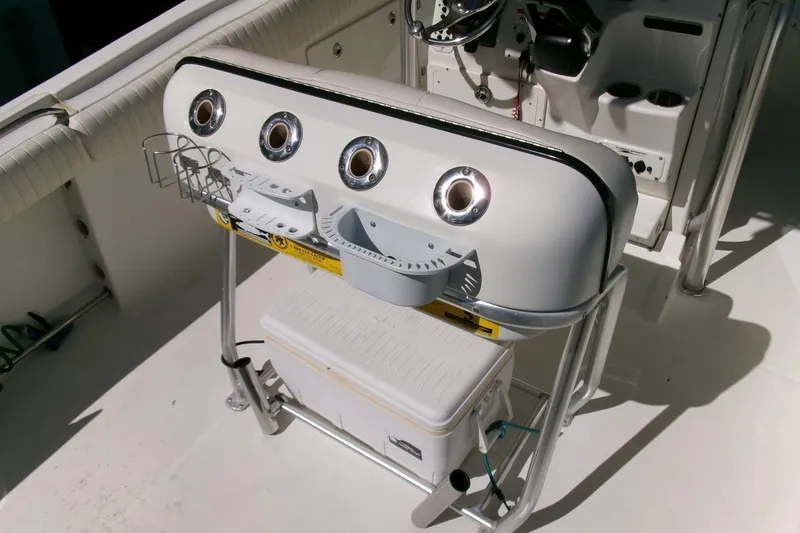 Slide: The Image of 2009 Hydra-Sports 2500 CC boat interior with rod holders and storage. - 19
