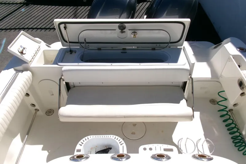 Slide: The Image of 2009 Hydra-Sports 2500 CC boat interior with seating and storage compartments. - 25