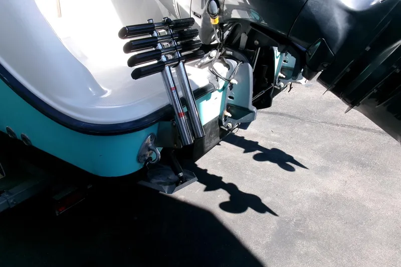 Slide: The Image of 2009 Hydra-Sports 2500 CC boat with outboard motor and ladder detail. - 26