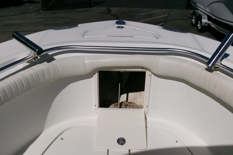 Slide: The Image of 2009 Hydra-Sports 2500 CC boat interior with open storage compartment. - 5