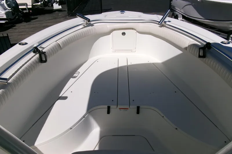 Slide: The Image of 2009 Hydra-Sports 2500 CC boat interior, featuring spacious seating and storage. - 7