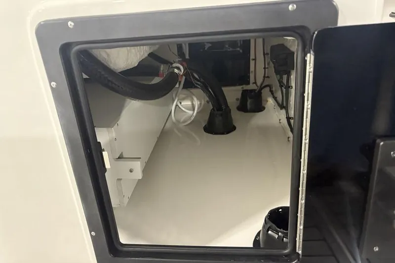 Slide: The Image of Interior view of 2026 Tidewater 3100 Carolina Bay boat compartment. - 29