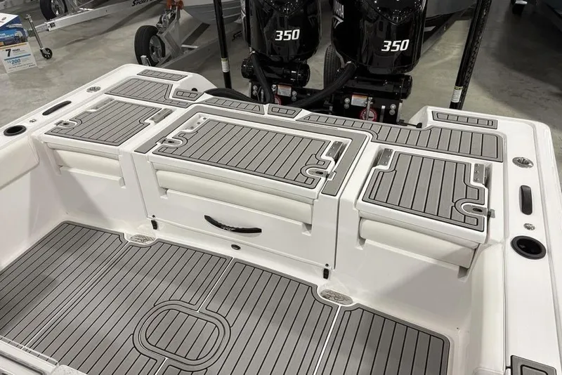 Slide: The Image of 2026 Tidewater 3100 Carolina Bay boat deck with dual Yamaha 350 engines. - 34