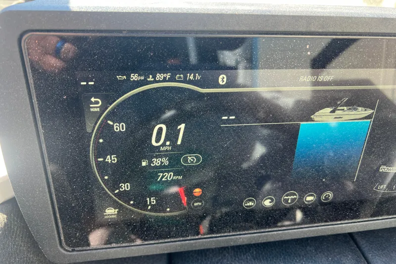 Slide: The Image of Dashboard display of a 2020 Malibu Wakesetter 23 MXZ boat showing speed and fuel levels. - 14