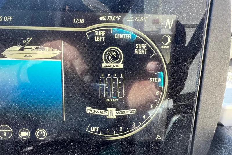 Slide: The Image of Dashboard of a 2020 Malibu Wakesetter 23 MXZ showing surf and ballast controls. - 15