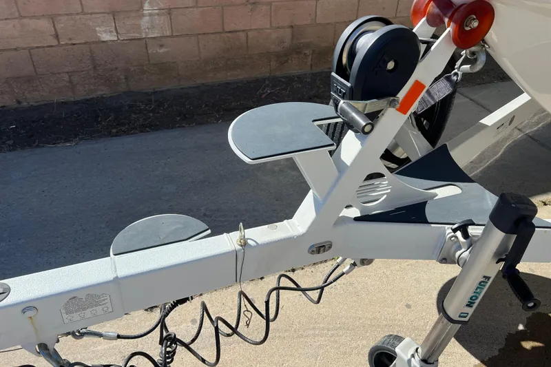 Slide: The Image of Trailer hitch of 2020 Malibu Wakesetter 23 MXZ boat, featuring sturdy construction and winch. - 21