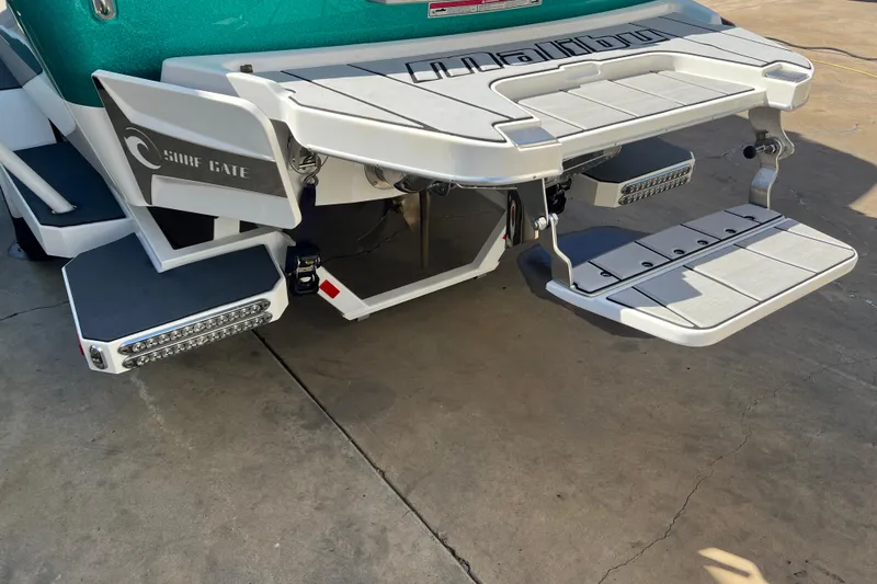 Slide: The Image of 2020 Malibu Wakesetter 23 MXZ boat with Surf Gate technology, rear view. - 3