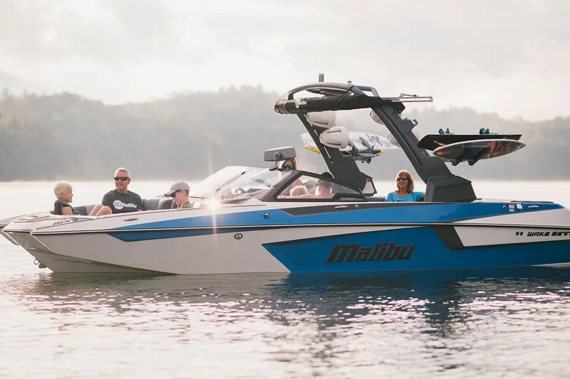 Slide: The Image of Manufacturer Provided Image: 2020 Malibu Wakesetter 23 MXZ boat on a lake with passengers. - 39