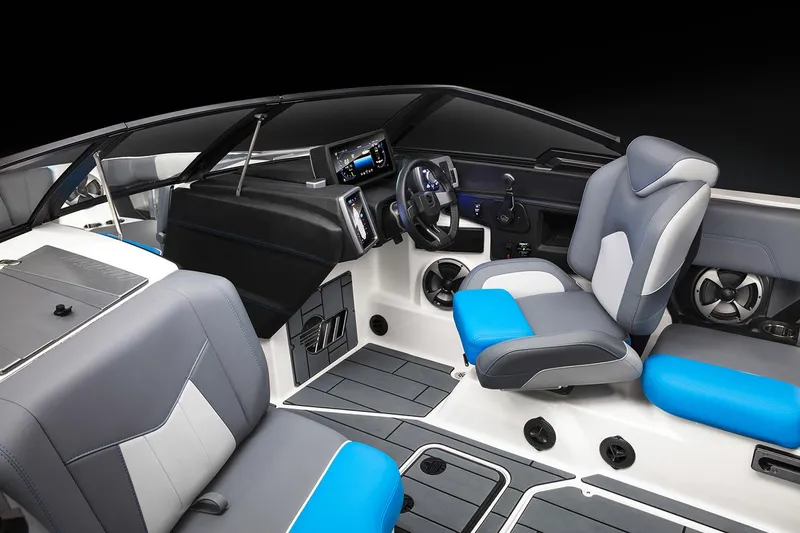 Slide: The Image of Manufacturer Provided Image: 2020 Malibu Wakesetter 23 MXZ boat interior with modern dashboard and blue-gray seating. - 43