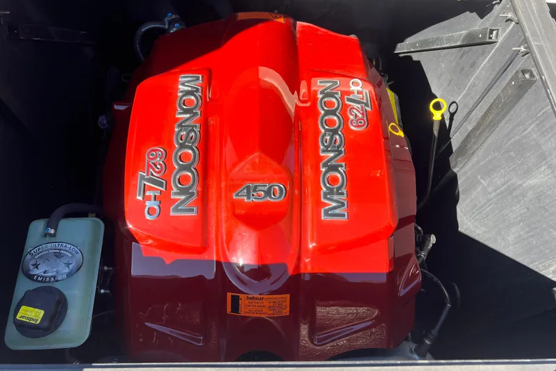 Slide: The Image of 2020 Malibu Wakesetter 23 MXZ with Monsoon 6.2L engine, red cover. - 6