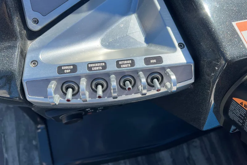 Slide: The Image of Control panel of 2020 Crest Caribbean RS 250 SLRC with labeled switches for lights and accessories. - 22