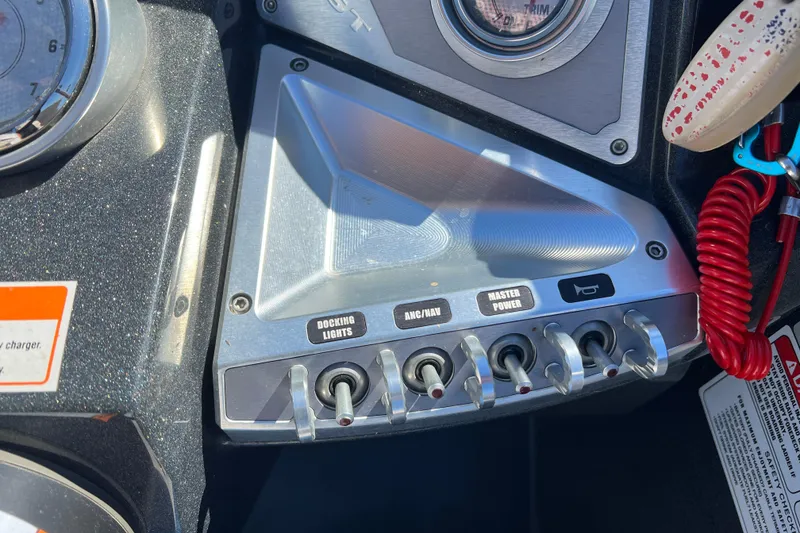 Slide: The Image of Control panel of 2020 Crest Caribbean RS 250 SLRC boat with switches and gauges. - 23