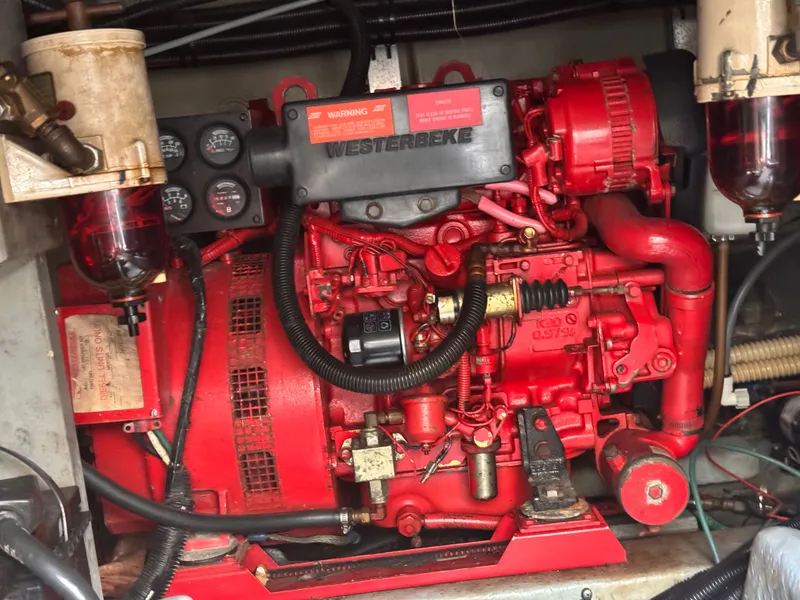 Slide: The Image of Engine compartment of a 1995 Sea Ray 400 Express Cruiser with Westerbeke generator. - 9