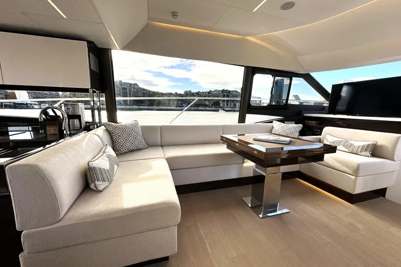 Slide: The Image of Luxurious interior of 2023 Prestige 590 yacht with elegant seating and modern design. - 47