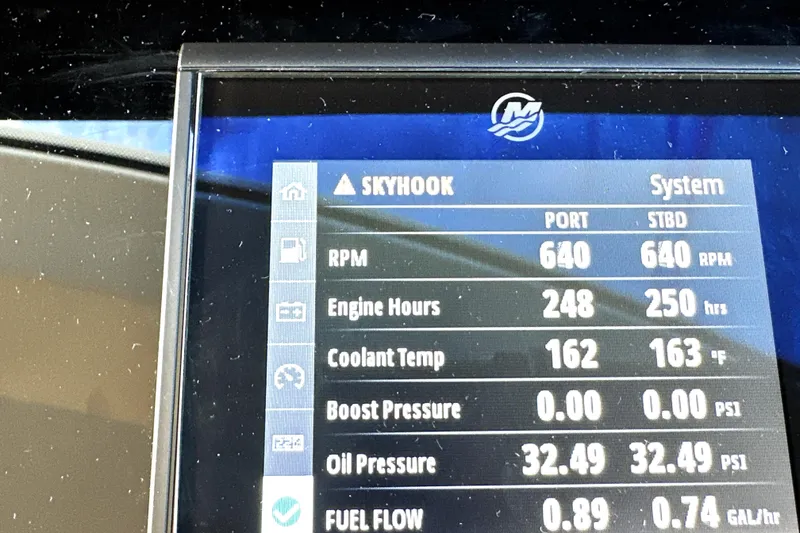 Slide: The Image of Display screen of 2023 Prestige 590 showing engine metrics like RPM and coolant temperature. - 56