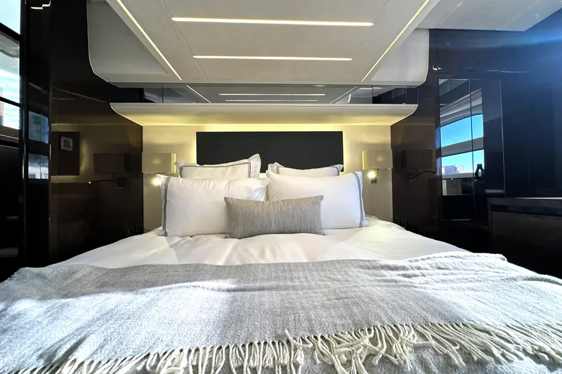 Slide: The Image of Luxurious bedroom interior of 2023 Prestige 590 yacht with elegant bedding and modern design. - 71