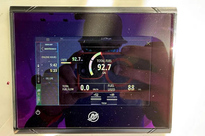 Slide: The Image of Display screen of 2023 Sea Pro 320 DLX Offshore showing fuel and engine data. - 49