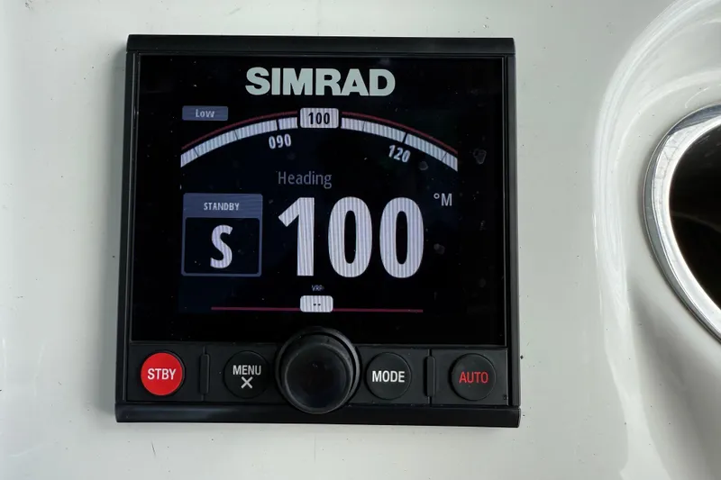 Slide: The Image of Simrad navigation display on 2023 Sea Pro 320 DLX Offshore boat, showing heading 100 degrees. - 50