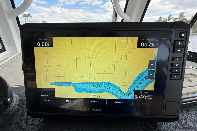 Slide: The Image of Garmin GPS display on 2023 Sea Pro 320 DLX Offshore boat, showing navigation map. - 53