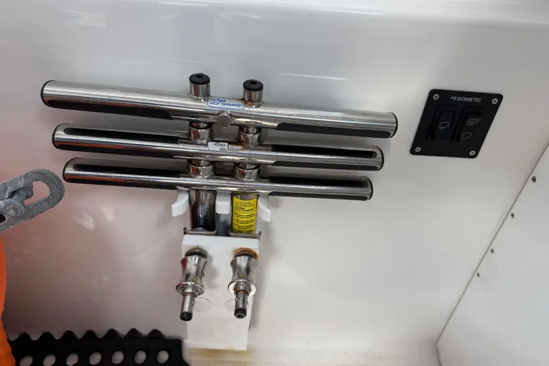 Slide: The Image of Stainless steel rod holders on 2023 Sea Pro 320 DLX Offshore boat, with control panel. - 62