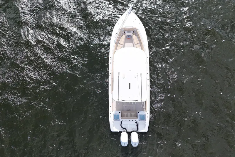 Slide: The Image of Overhead view of 2023 Sea Pro 320 DLX Offshore boat on water. - 8