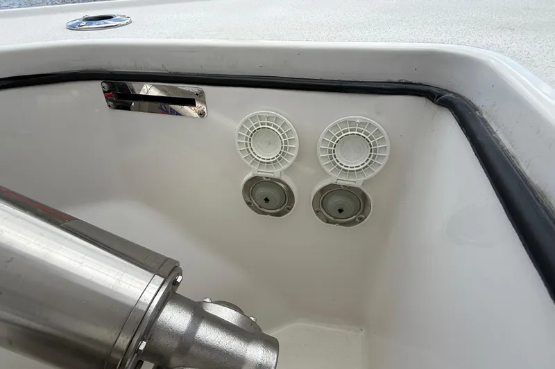 Slide: The Image of 2023 Sea Pro 320 DLX Offshore boat interior detail with fittings and stainless steel components. - 82