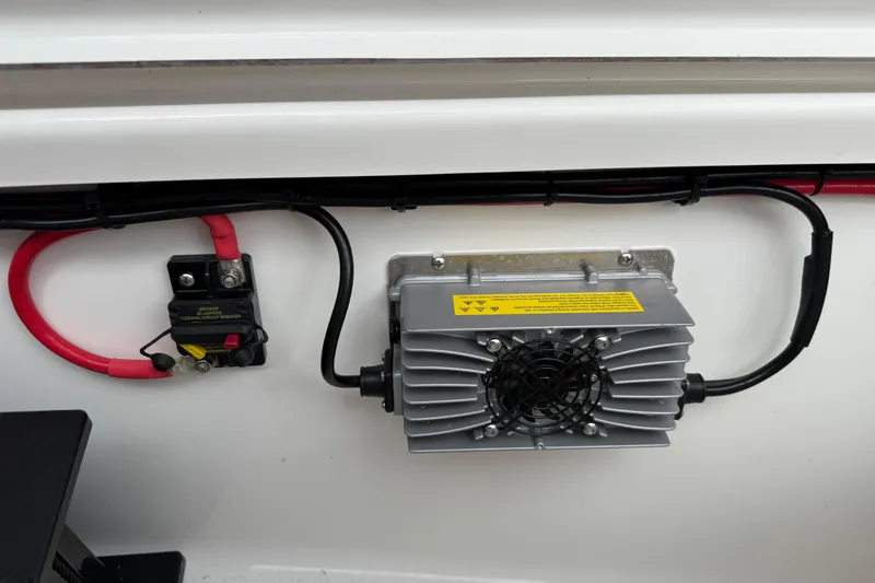 Slide: The Image of 2023 Sea Pro 320 DLX Offshore boat electrical components, including circuit breaker and wiring. - 88