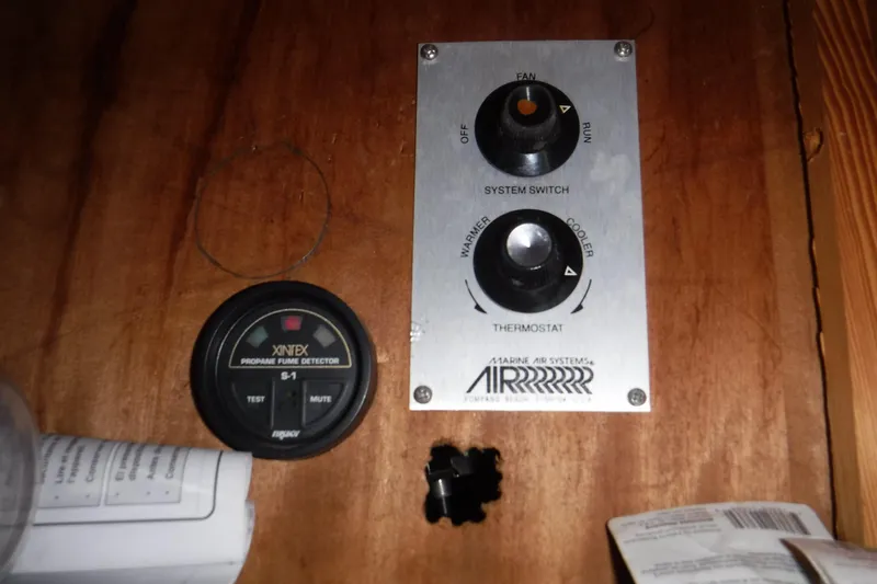 Slide: The Image of Control panel and propane fume detector on 1988 Dudley Dix Echo 38 boat. - 15