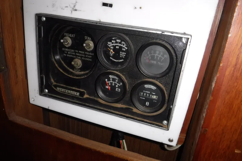 Slide: The Image of Control panel of a 1988 Dudley Dix Echo 38 sailboat with gauges and switches. - 16